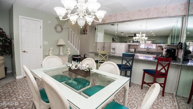 dining space featuring a chandelier