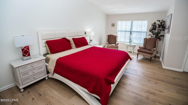 bedroom with light wood-type flooring