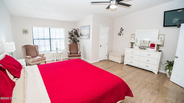 bedroom featuring ceiling fan and light hardwood / wood-style flooring