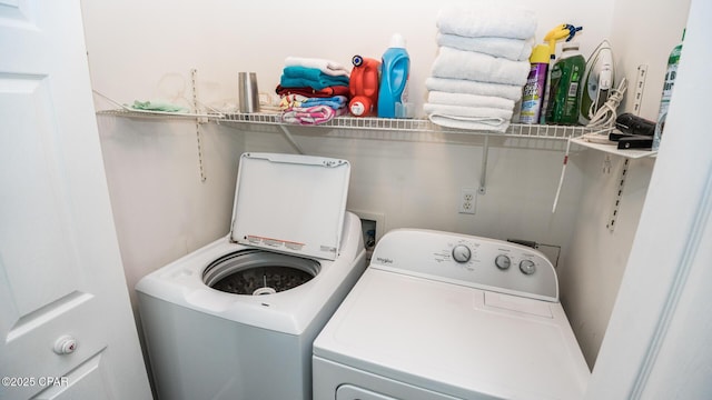 laundry area with washer and dryer