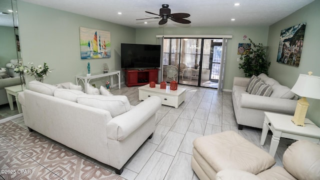 living room with ceiling fan