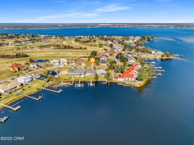 bird's eye view with a water view