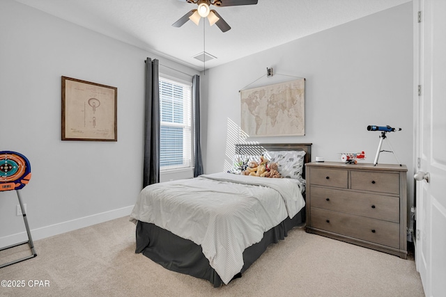 bedroom with ceiling fan and light carpet