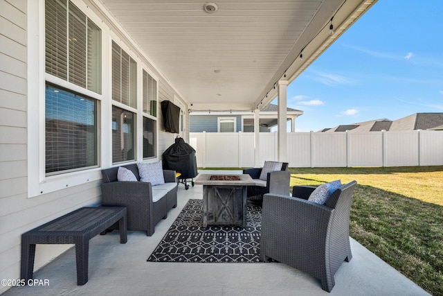 view of patio featuring an outdoor fire pit