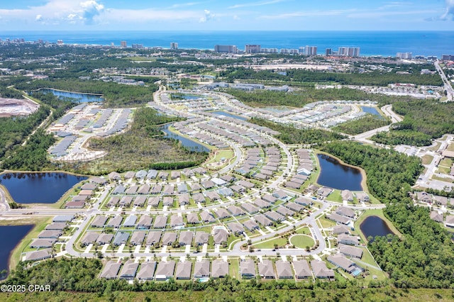 drone / aerial view with a water view