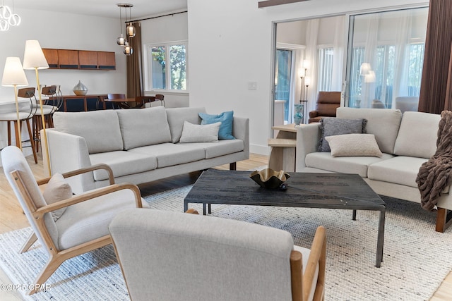 living room with light hardwood / wood-style floors