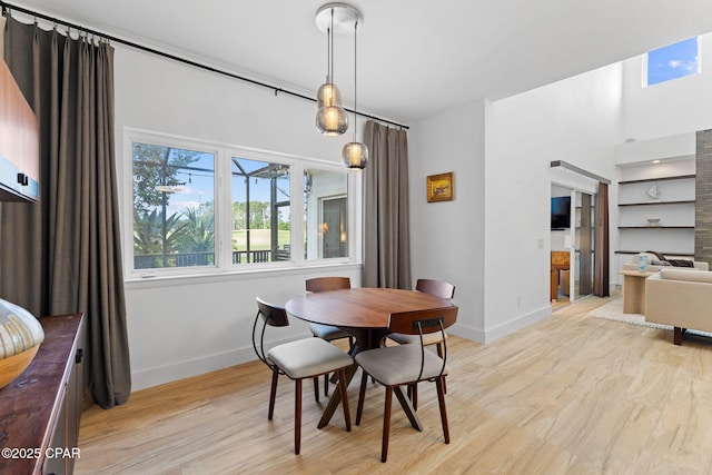 dining room featuring light hardwood / wood-style floors