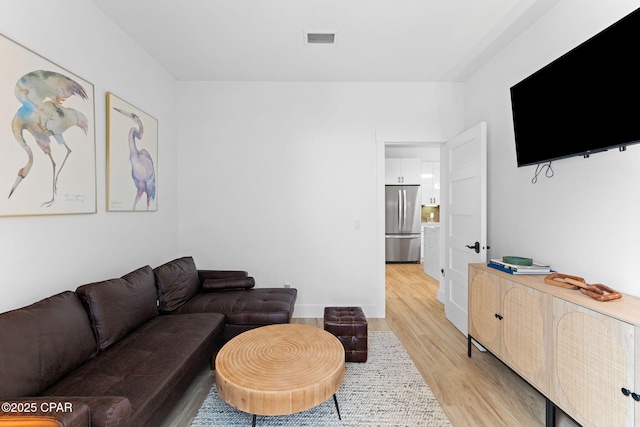 living room with light wood-type flooring