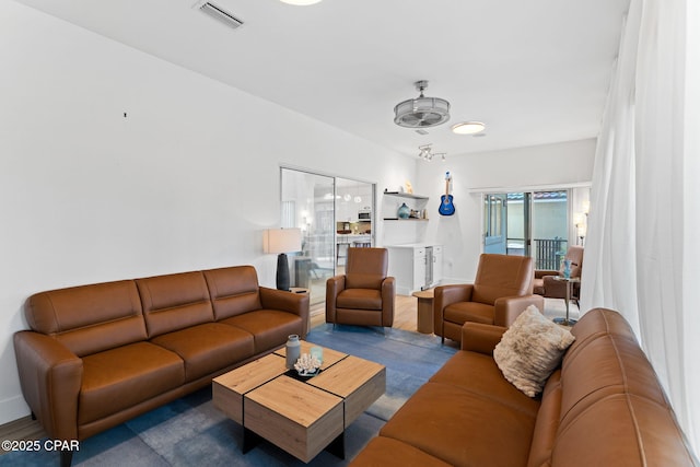 living room with hardwood / wood-style flooring