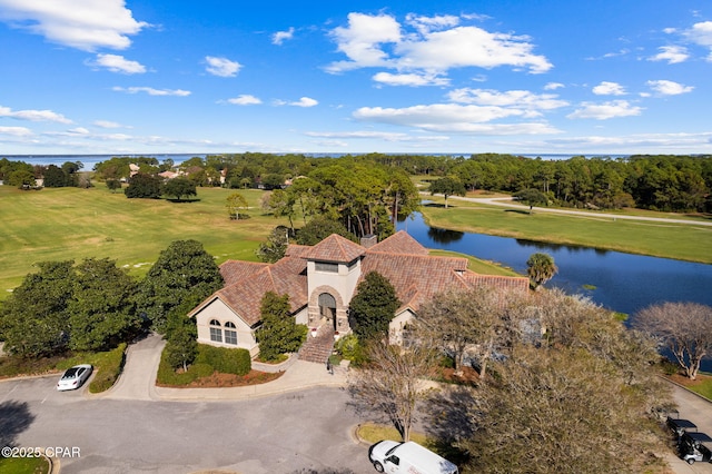 drone / aerial view with a water view