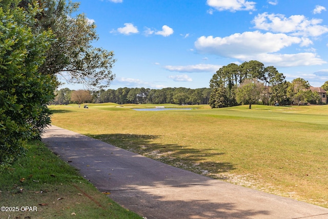 surrounding community featuring a lawn