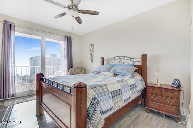 bedroom featuring light hardwood / wood-style flooring and ceiling fan