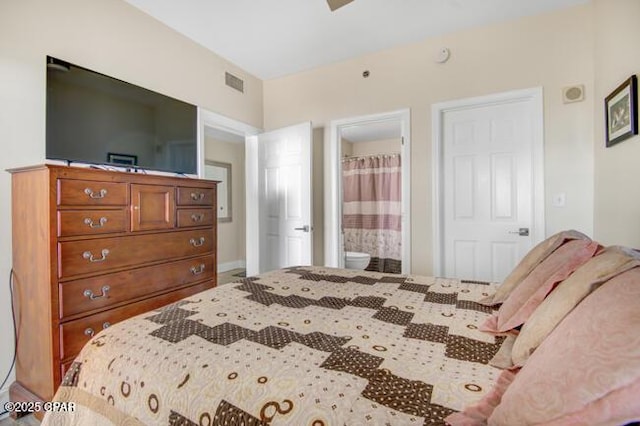 bedroom featuring connected bathroom