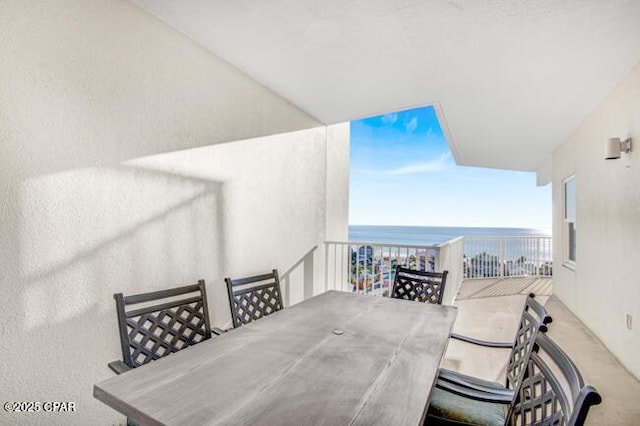 dining space with a water view