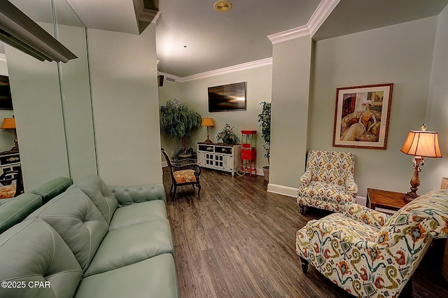 living room with dark wood-type flooring and crown molding