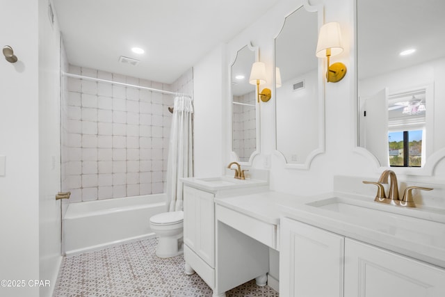 full bathroom with double vanity, visible vents, shower / tub combo, and a sink