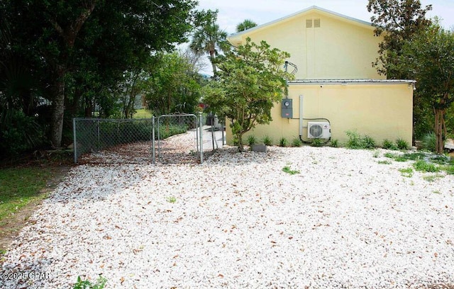 exterior space with ac unit