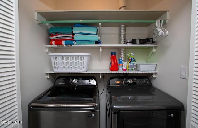 laundry area with washer and dryer