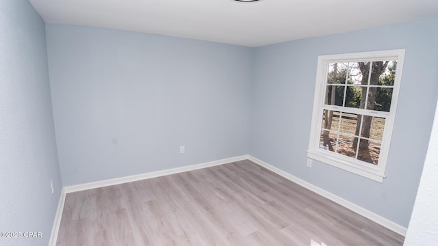 unfurnished room featuring light wood-type flooring