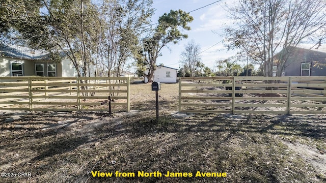 view of yard featuring a rural view