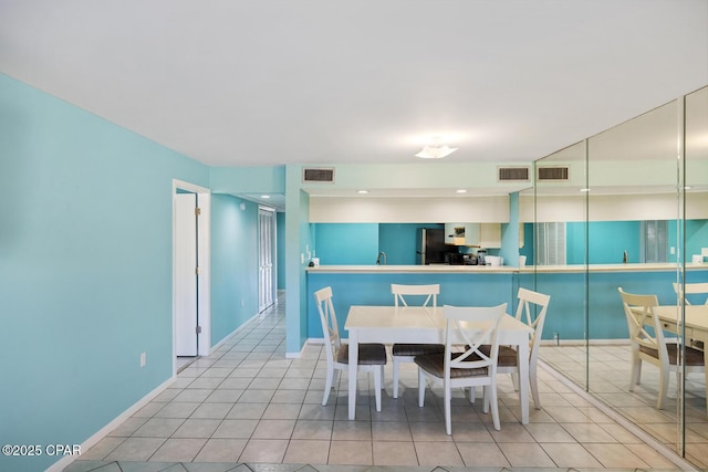 view of tiled dining space