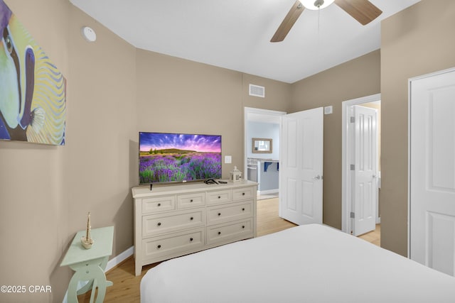 bedroom with ceiling fan and light hardwood / wood-style flooring