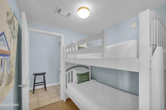 bedroom with tile patterned flooring