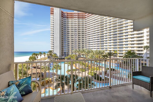 balcony featuring a water view