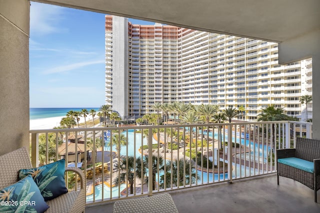 balcony featuring a water view