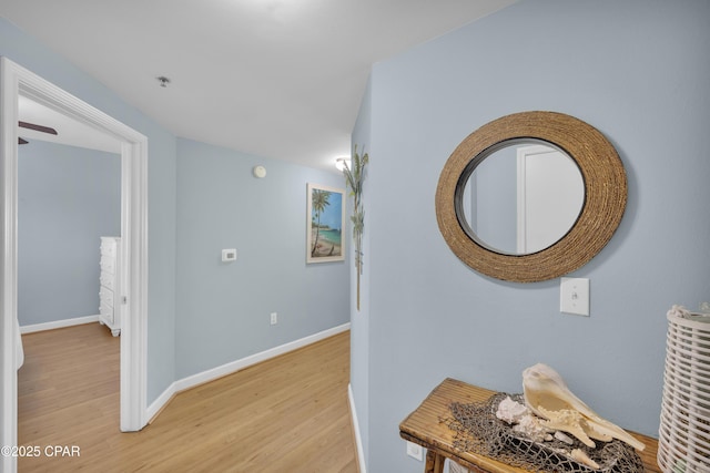 hallway featuring light wood-type flooring