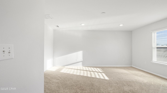 view of carpeted spare room