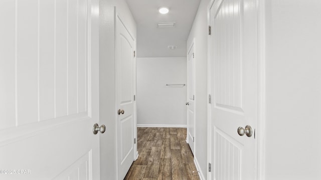 hall featuring dark hardwood / wood-style floors