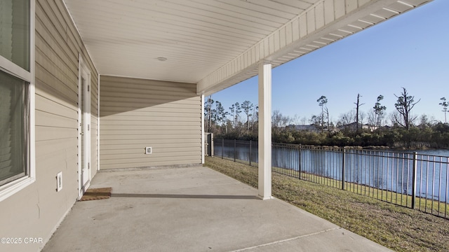 view of patio / terrace featuring a water view