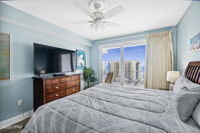 bedroom featuring hardwood / wood-style flooring and ceiling fan