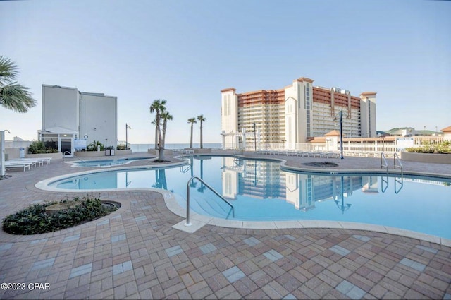 view of pool featuring a patio