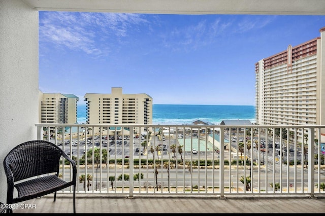 balcony featuring a water view