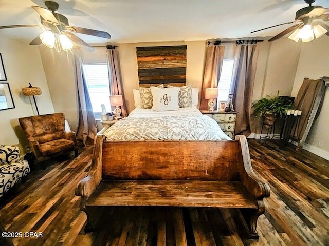 bedroom featuring dark hardwood / wood-style floors and ceiling fan