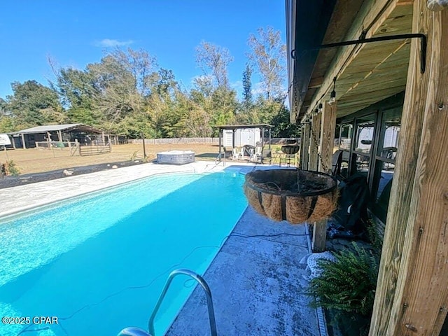 view of pool with a patio