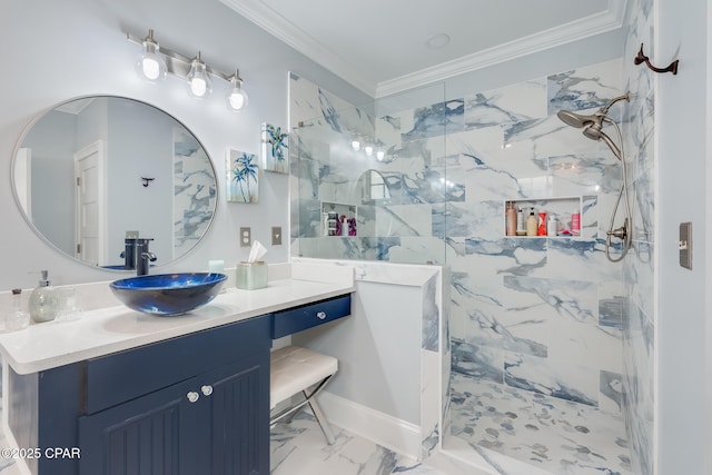 bathroom featuring a tile shower, crown molding, and vanity