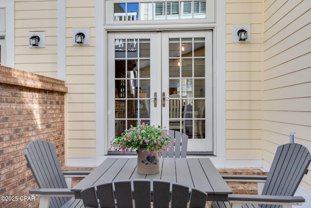 doorway to property featuring french doors