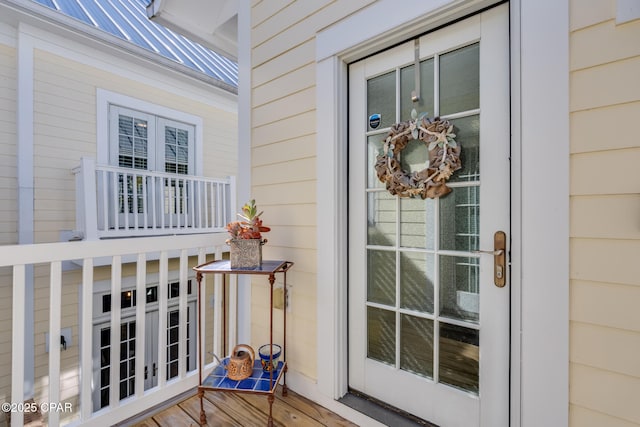 property entrance featuring french doors