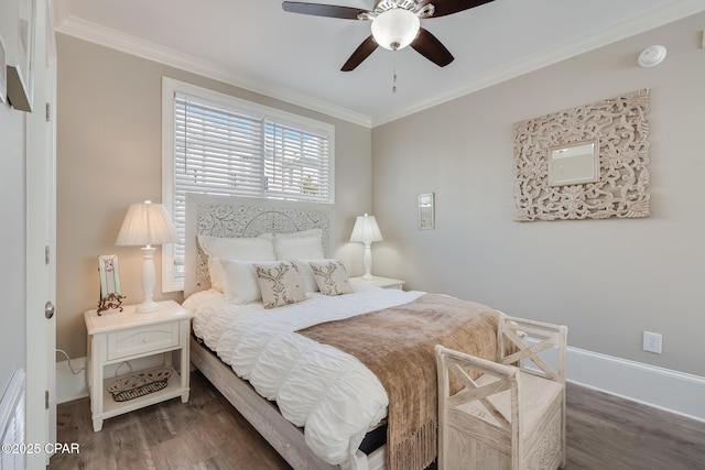 bedroom featuring ceiling fan, ornamental molding, and dark hardwood / wood-style floors