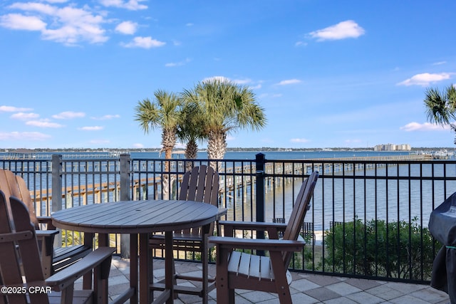 balcony featuring a water view