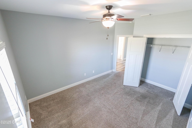 unfurnished bedroom featuring carpet flooring, a closet, and ceiling fan