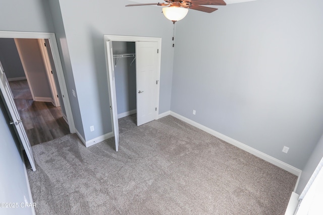 unfurnished bedroom featuring carpet flooring, a closet, and ceiling fan