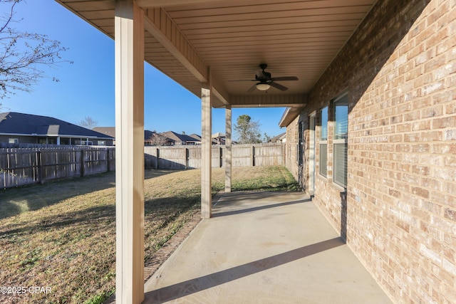 view of patio featuring ceiling fan