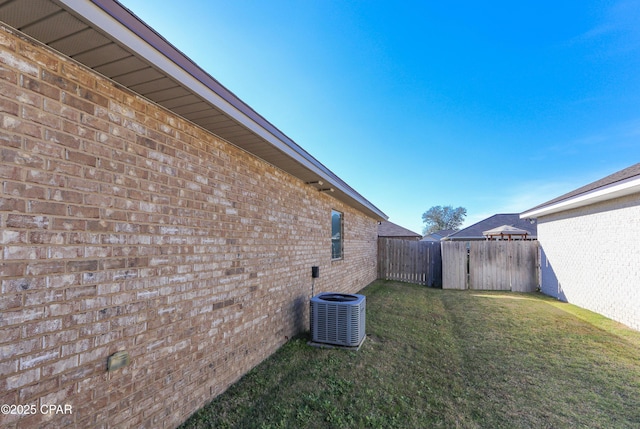 view of yard featuring central AC