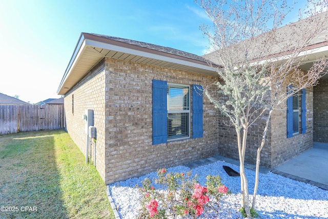 view of property exterior featuring a yard