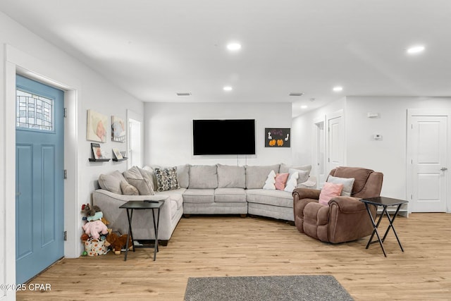 living room featuring light hardwood / wood-style floors