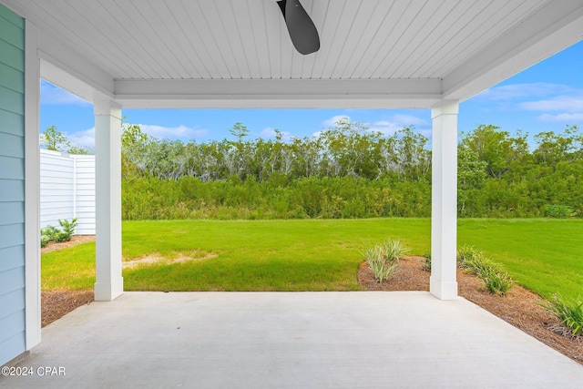 view of patio featuring ceiling fan